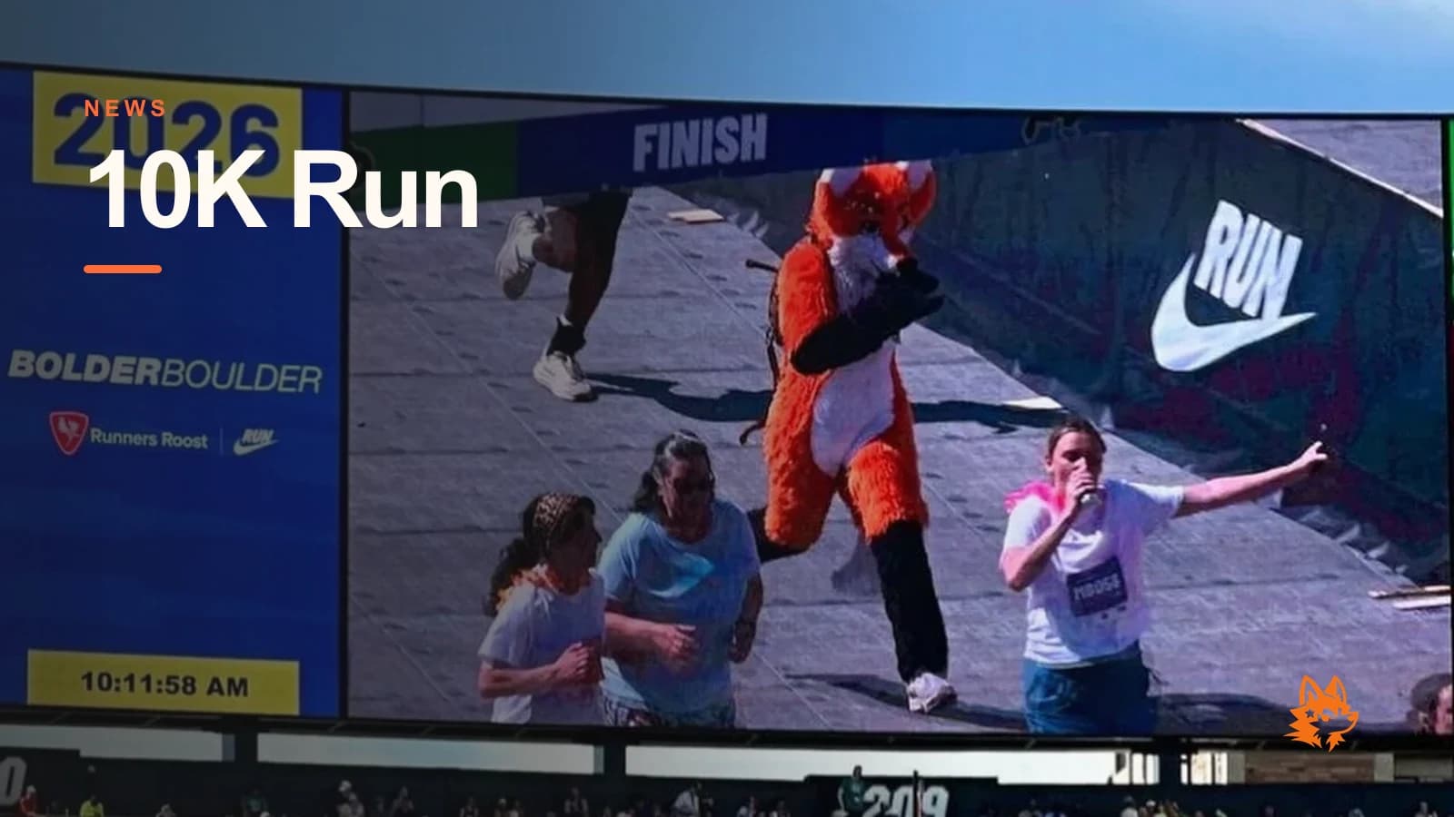Blaze the Foxx BolderBoulder cover using the jumbotron finish-line photo with a short 10K label.